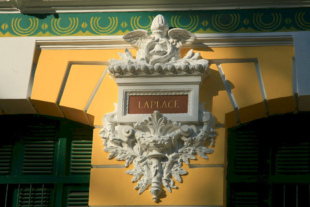 The names of French inventors pivotal in telegraphy and electricity are put between the old green windows